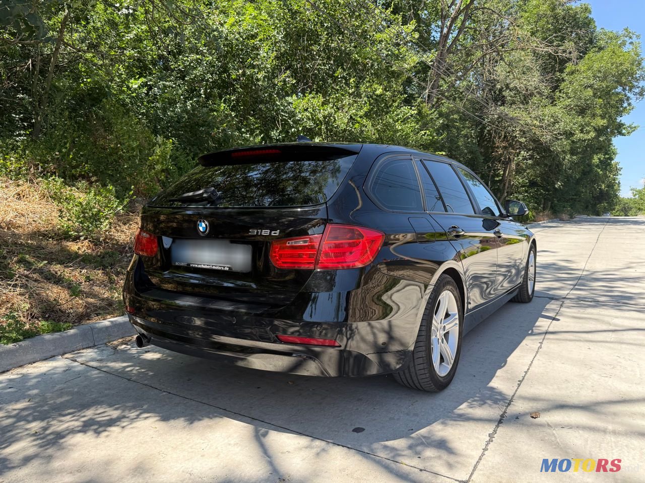 2013' BMW 3 Series Touring photo #3