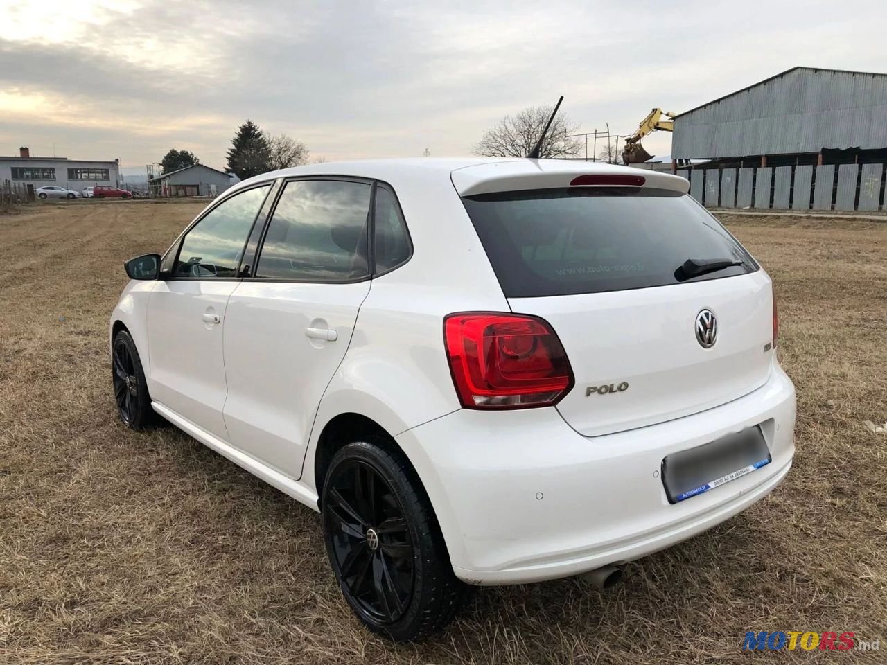 2011' Volkswagen Polo photo #1
