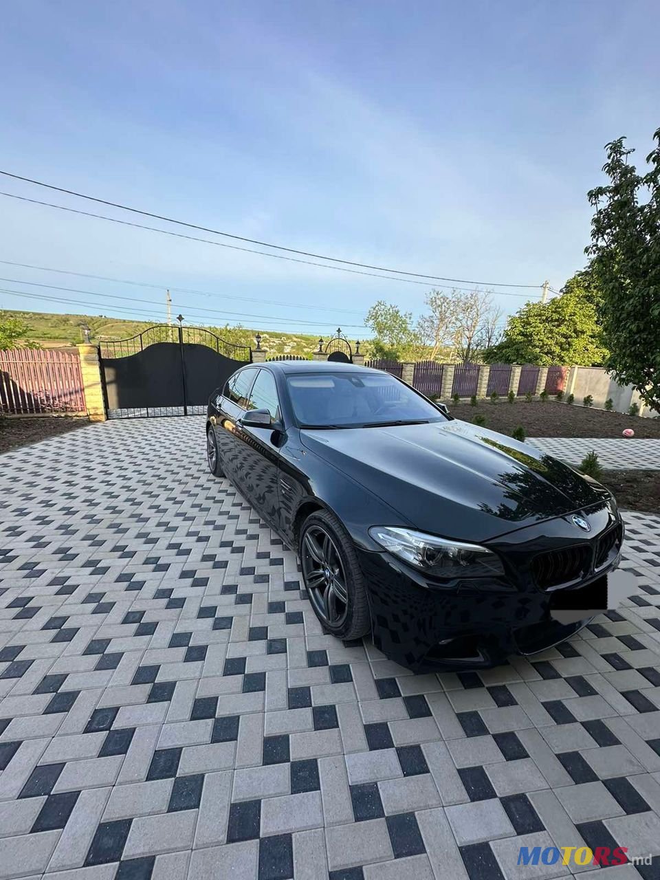 2014' BMW 5 Series photo #1