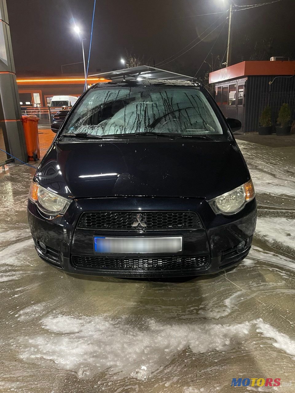 2009' Mitsubishi Colt photo #1