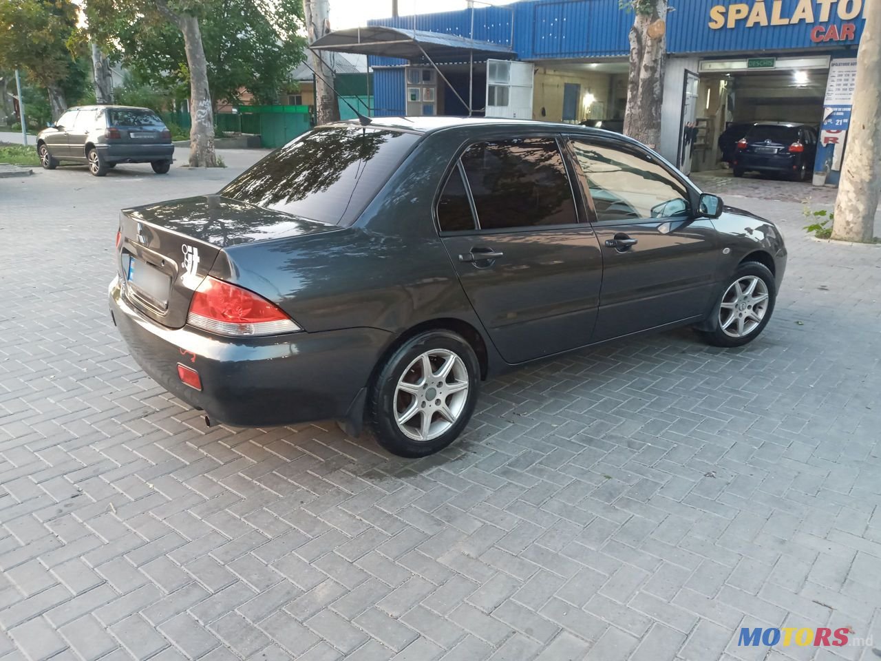 2004' Mitsubishi Lancer photo #3