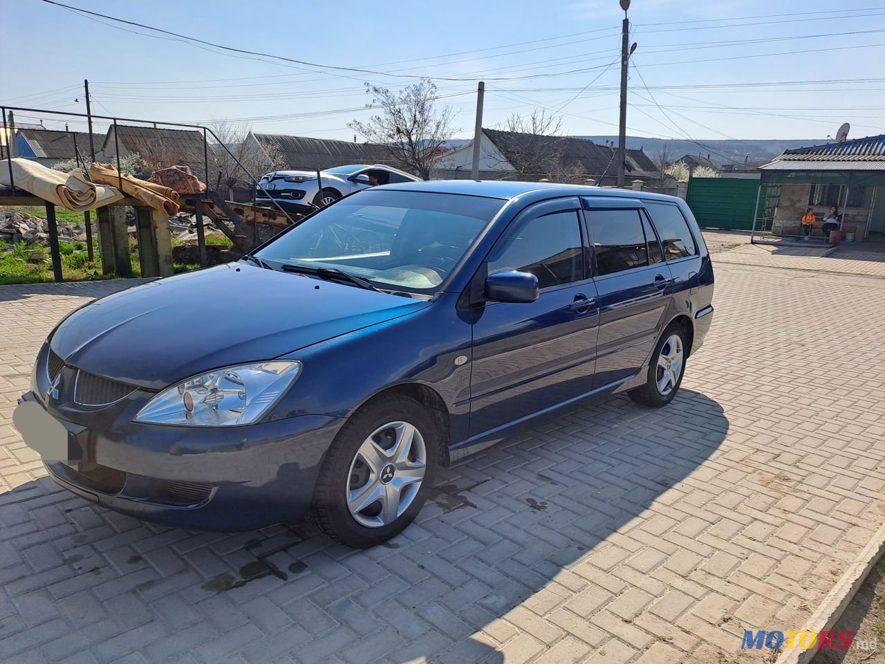 2004' Mitsubishi Lancer photo #2