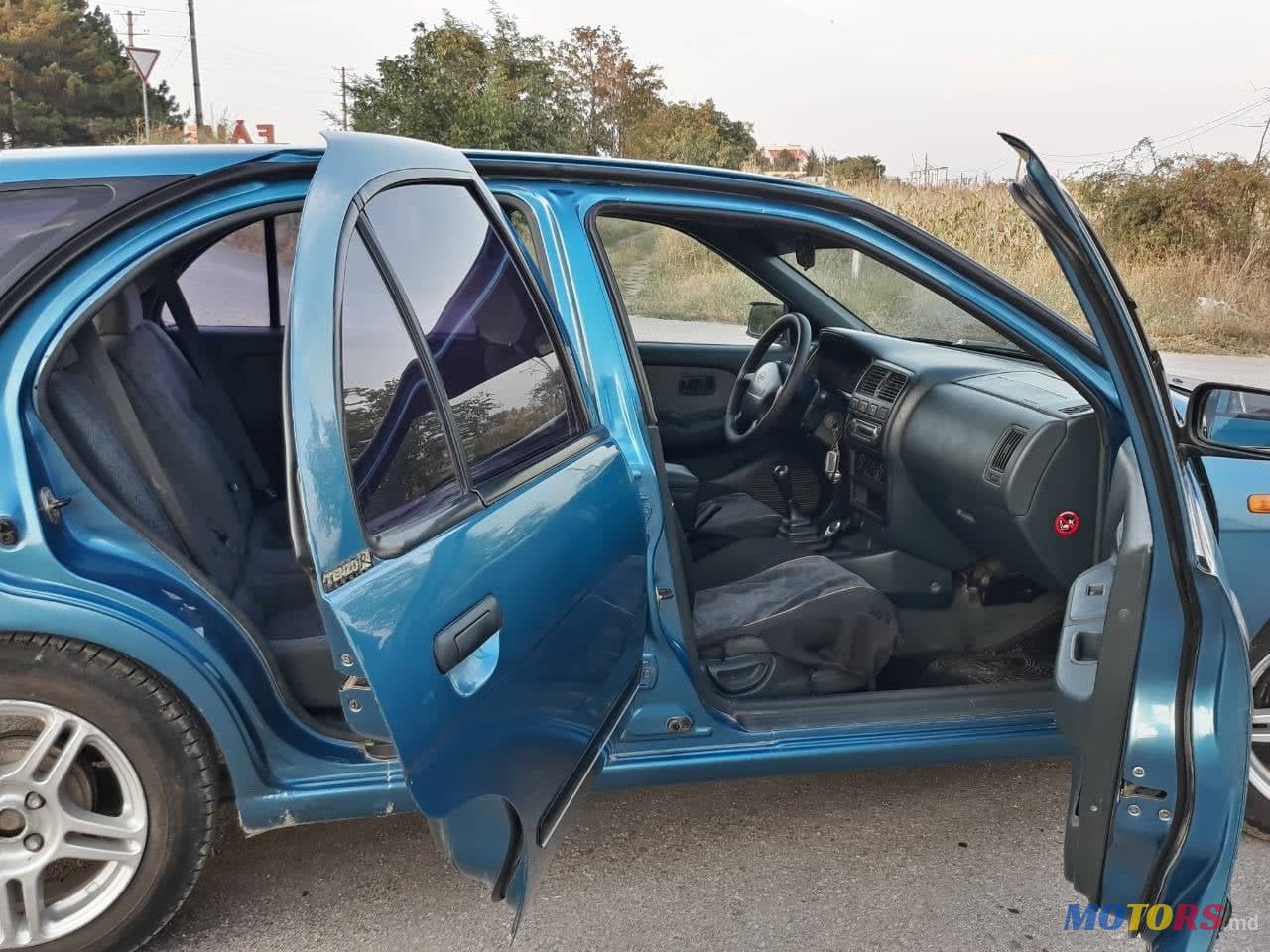 1997' Nissan Almera photo #1
