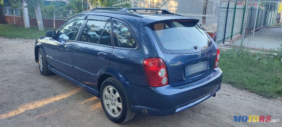 2002' Mazda 323 photo #5