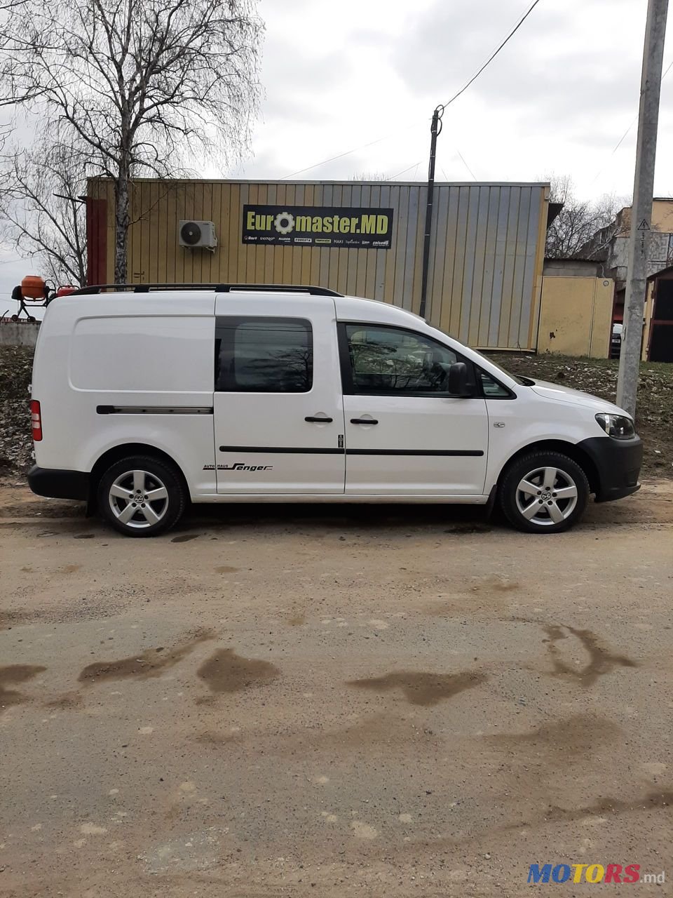 2015' Volkswagen Caddy photo #1