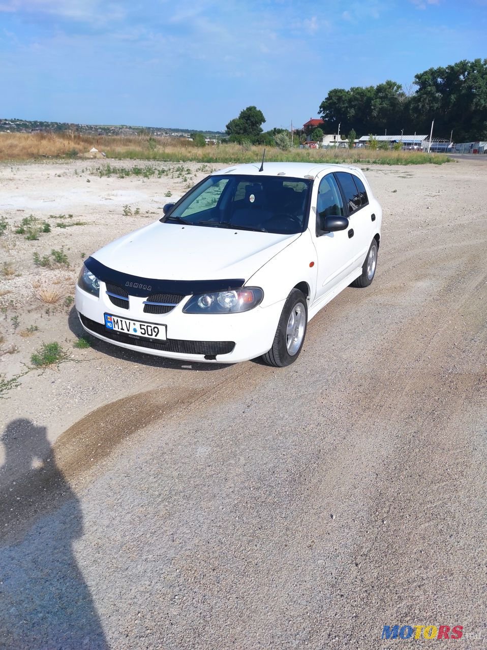 2004' Nissan Almera photo #1