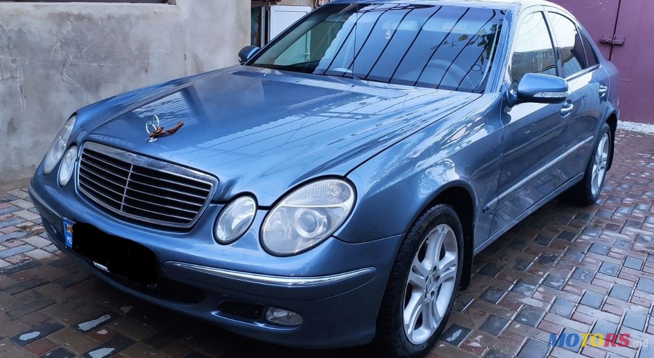 2004' Mercedes-Benz E Класс photo #1