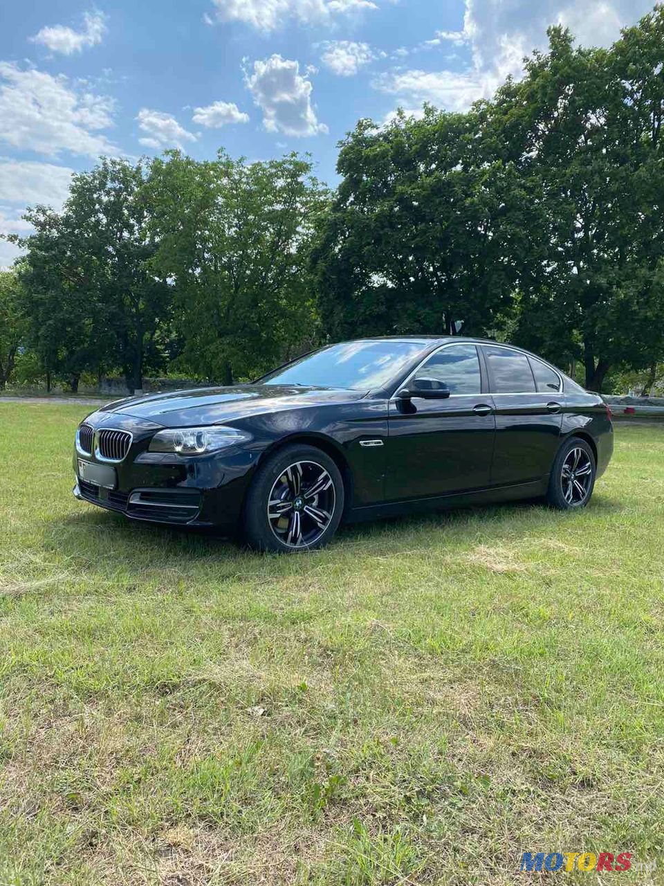 2015' BMW 5 Series photo #1