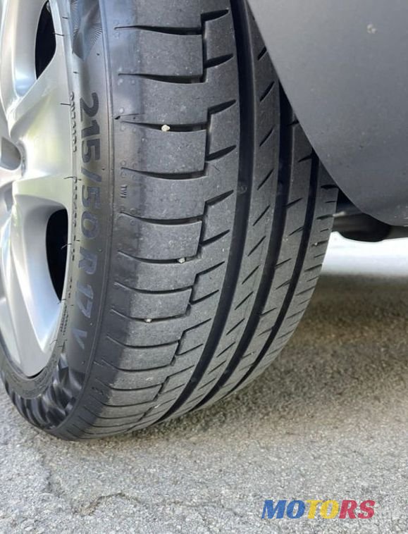 2011' Opel Astra photo #4