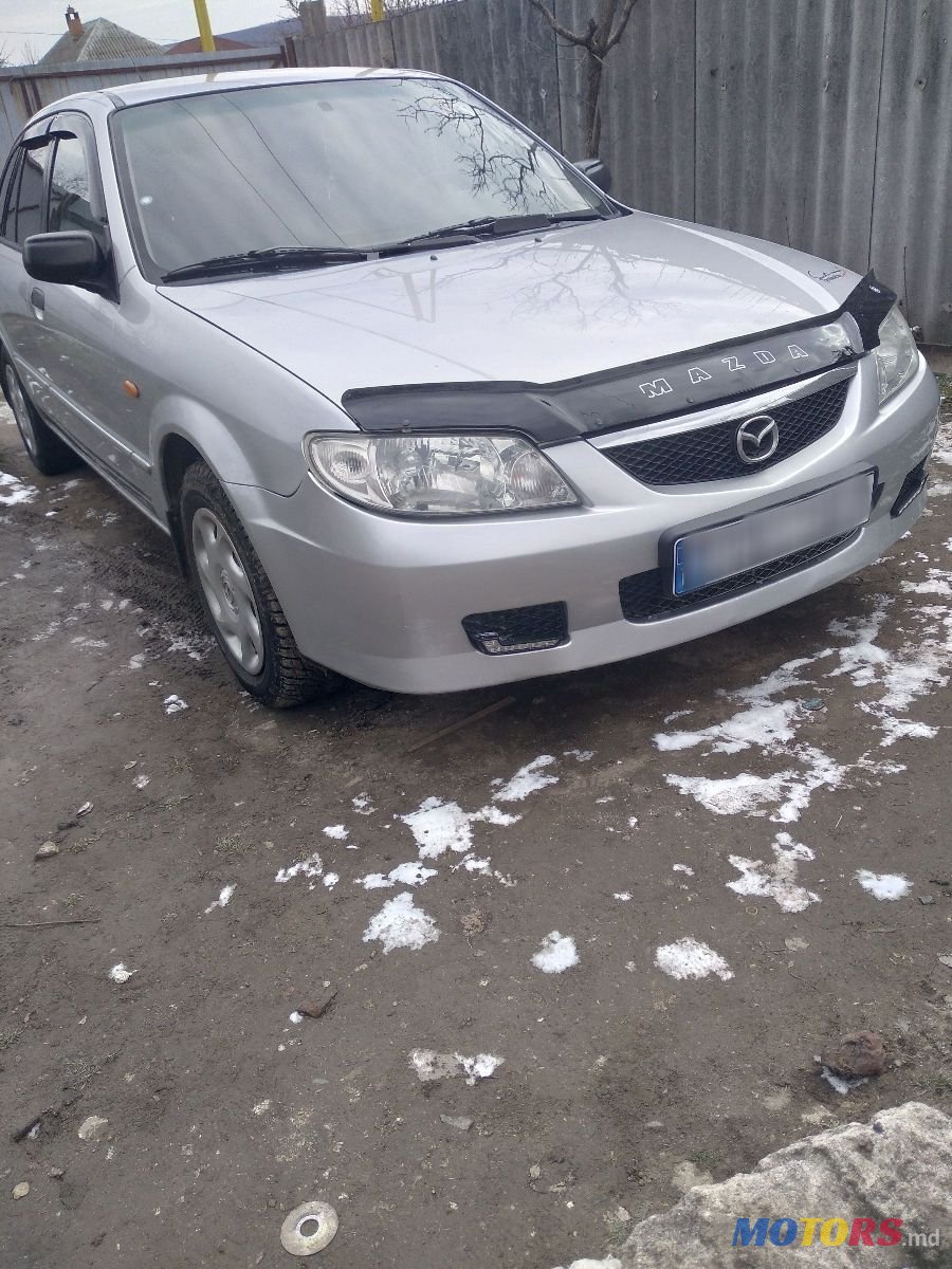 2003' Mazda 323 photo #1