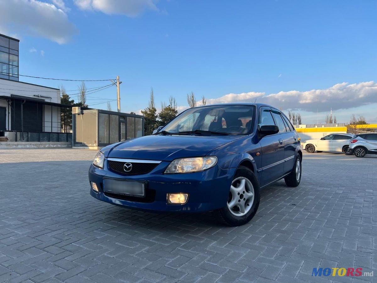 2001' Mazda 323 photo #2