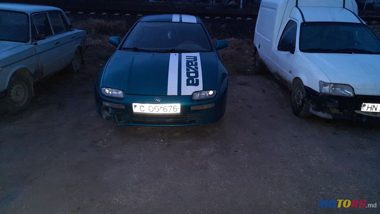 1995' Mazda 323 photo #1