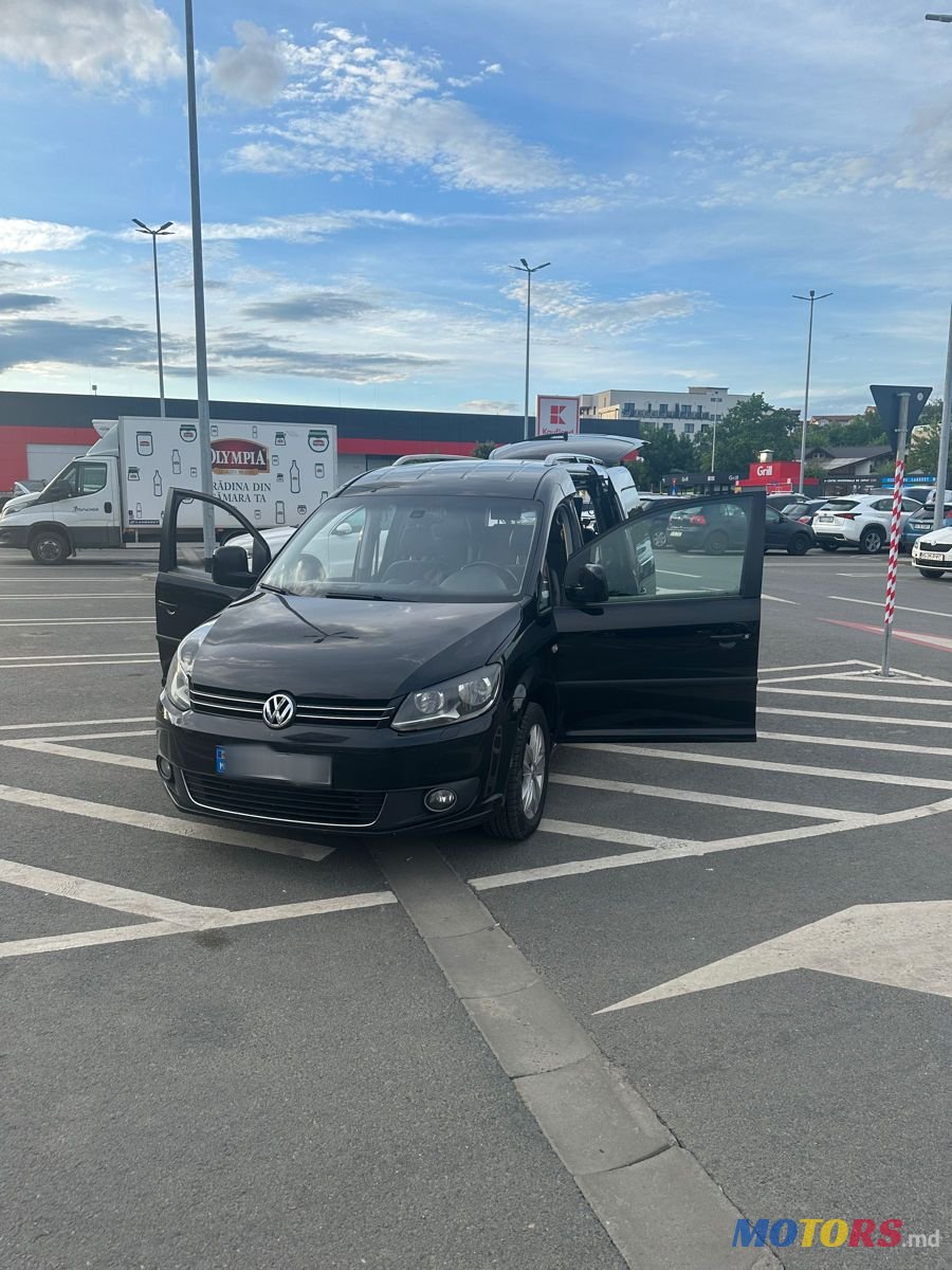 2013' Volkswagen Caddy photo #1