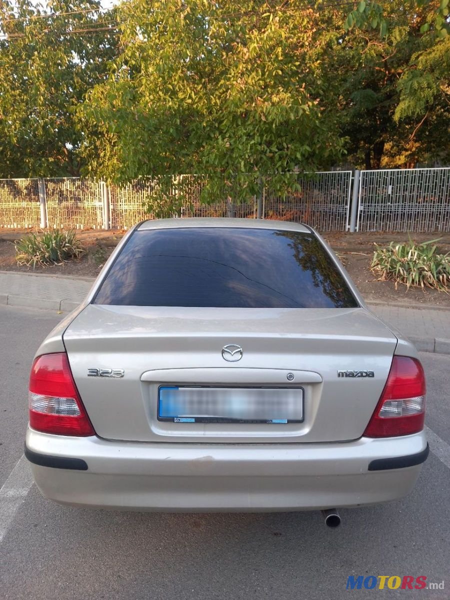 2000' Mazda 323 photo #4