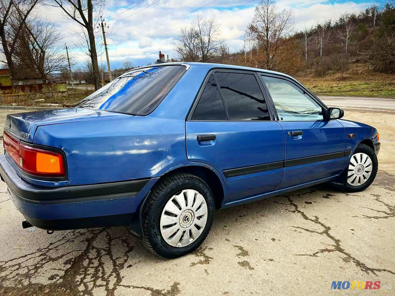 1993' Mazda 323 photo #6
