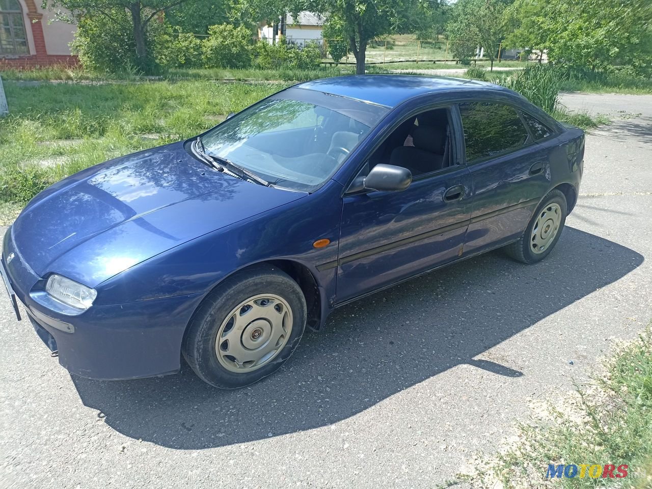 1996' Mazda 323 photo #5