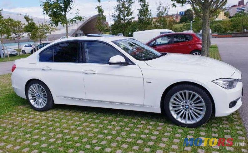 2012' BMW 3 photo #1