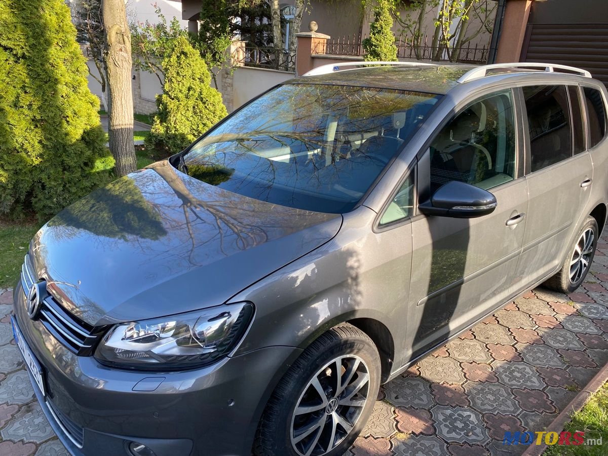 2014' Volkswagen Touran photo #1