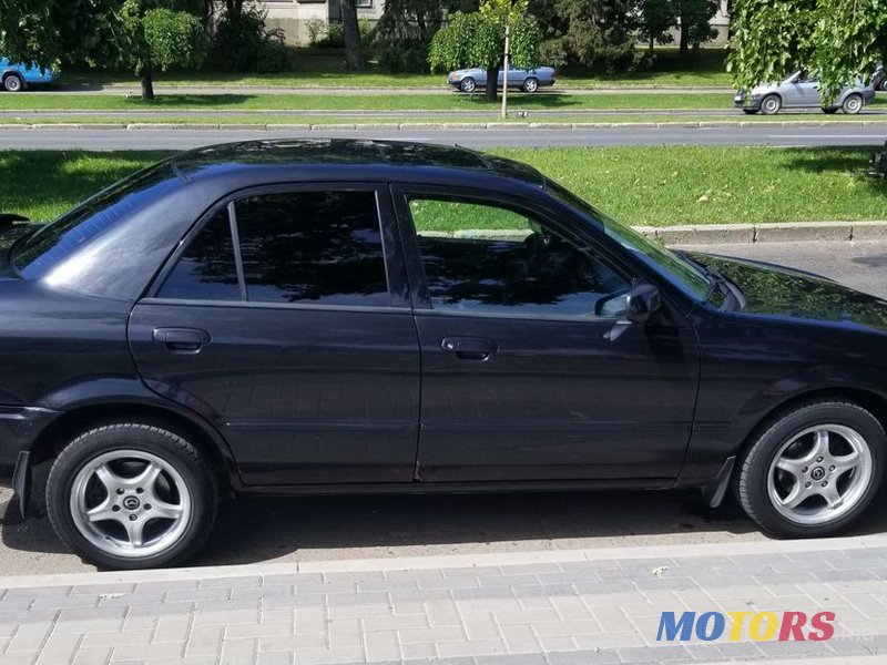 2002' Mazda 323 photo #2