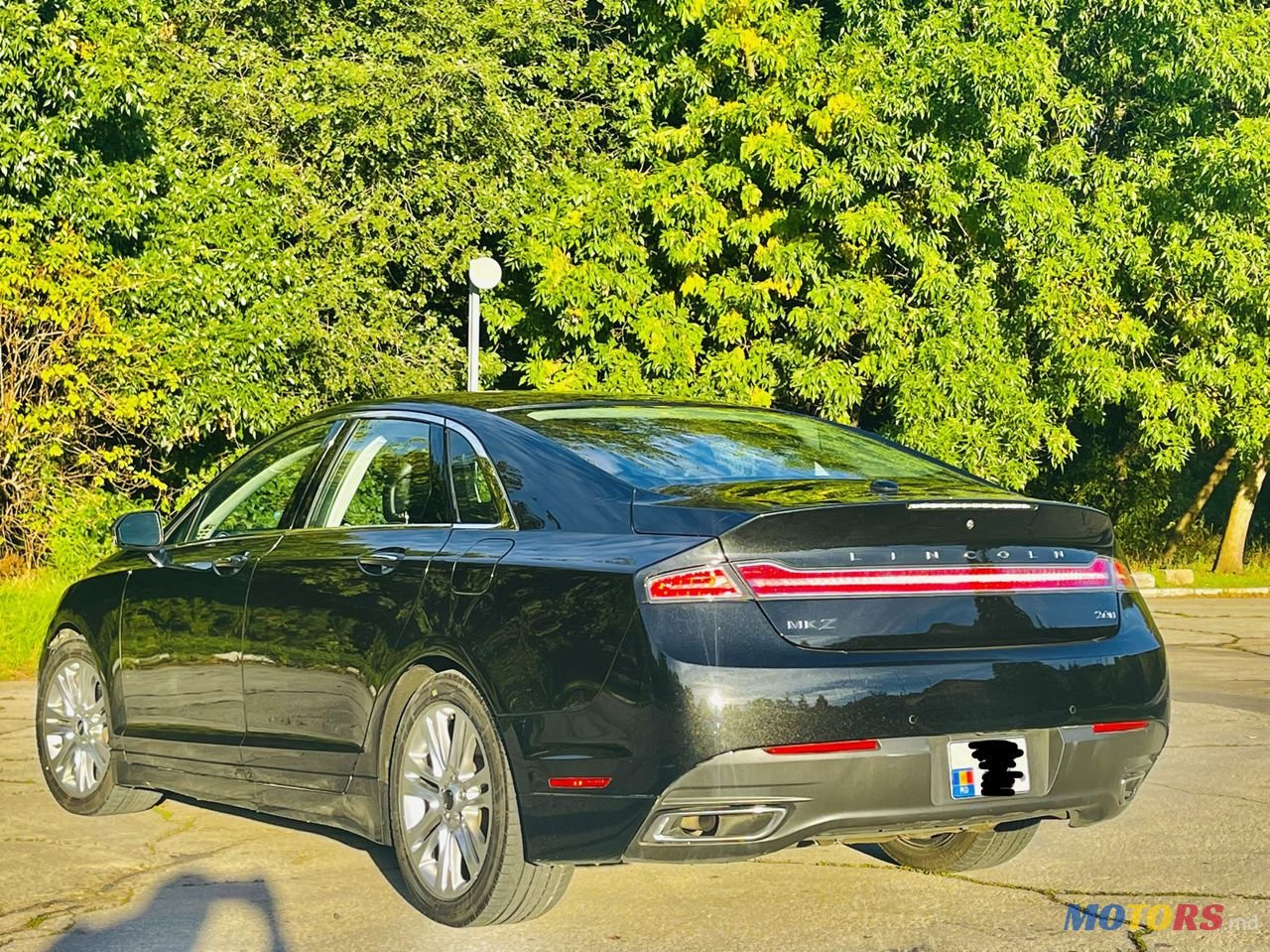 2014' Lincoln MKZ photo #2
