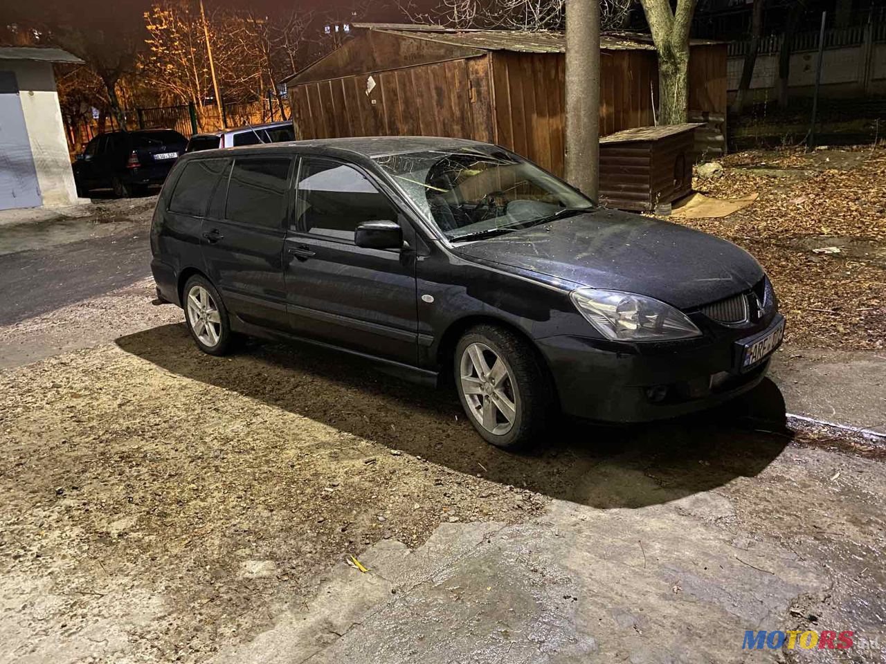 2004' Mitsubishi Lancer photo #4