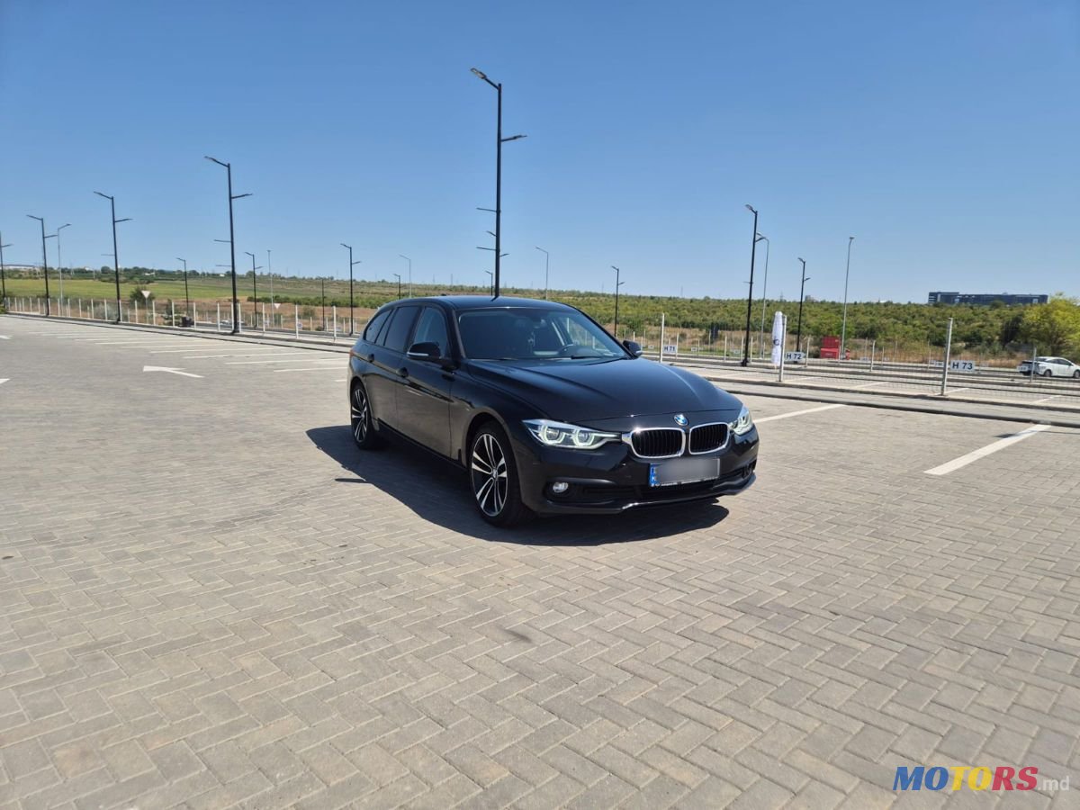 2017' BMW 3 Series Touring photo #2