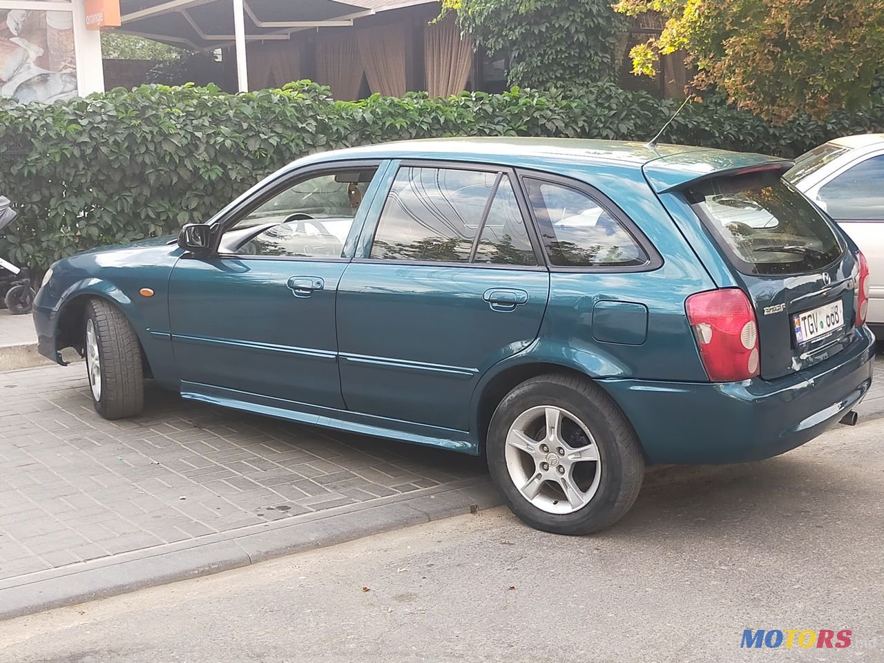 2002' Mazda 323 photo #4