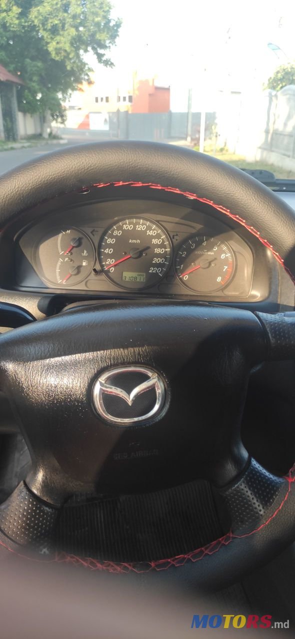 2000' Mazda 323 photo #2