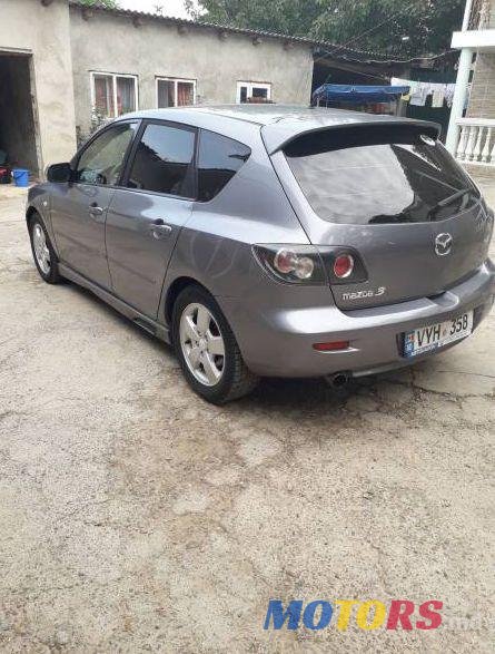 2004' Mazda 3 photo #1