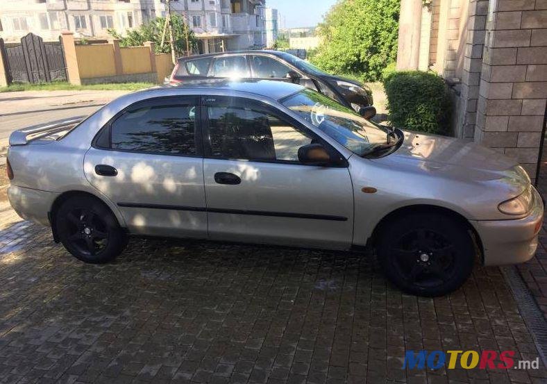 1995' Mazda 323 photo #1