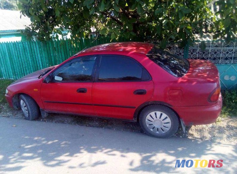 1995' Mazda 323 photo #1