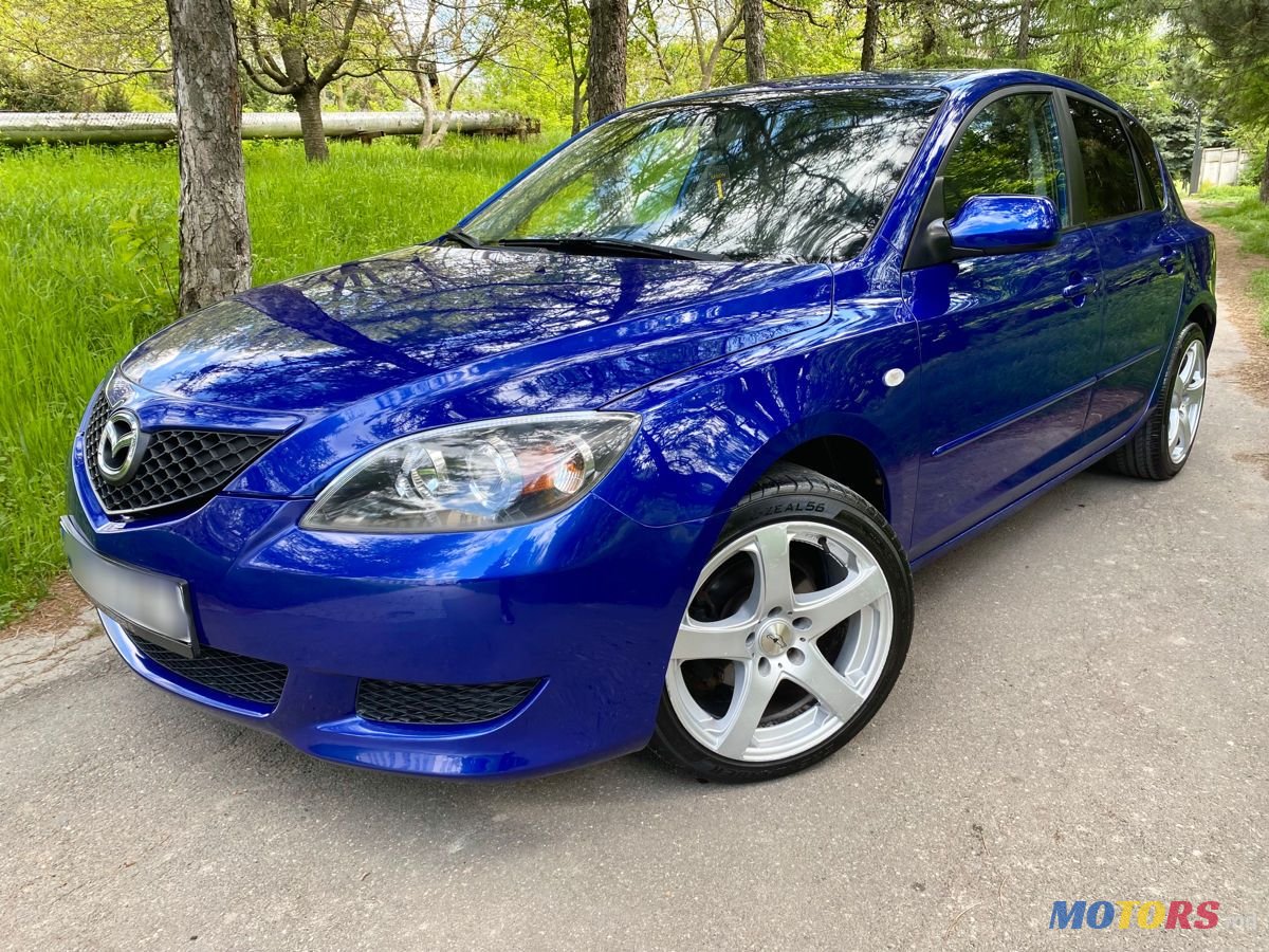2004' Mazda 3 photo #3