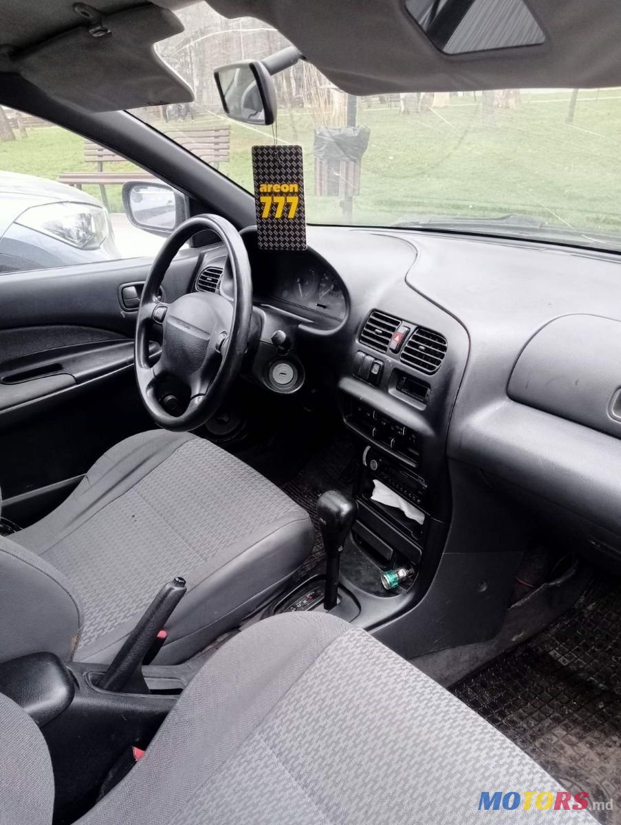 1995' Mazda 323 photo #4