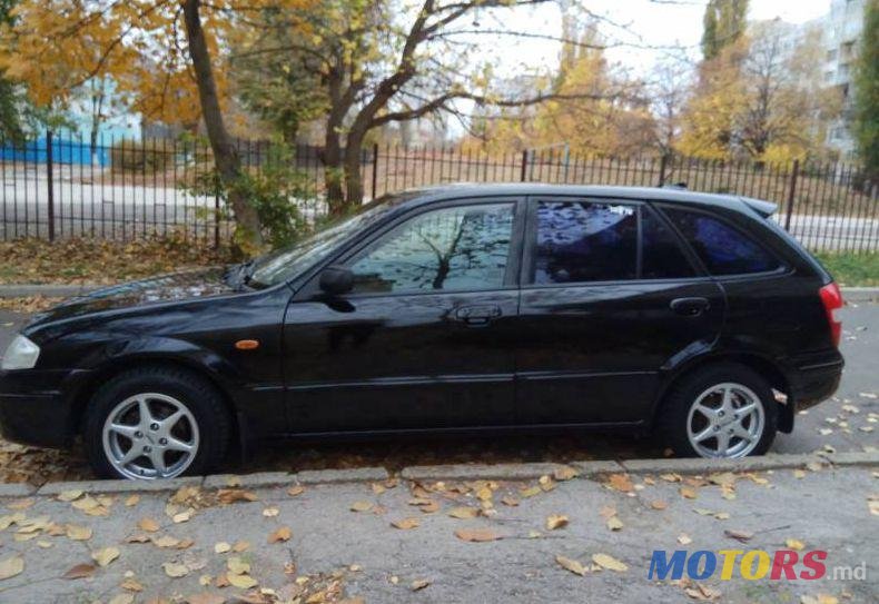 1999' Mazda 323 photo #1