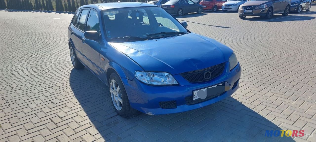 2001' Mazda 323 photo #3