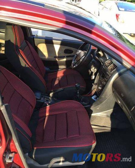 1998' Mitsubishi Carisma photo #1