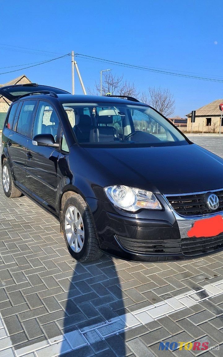2007' Volkswagen Touran photo #4