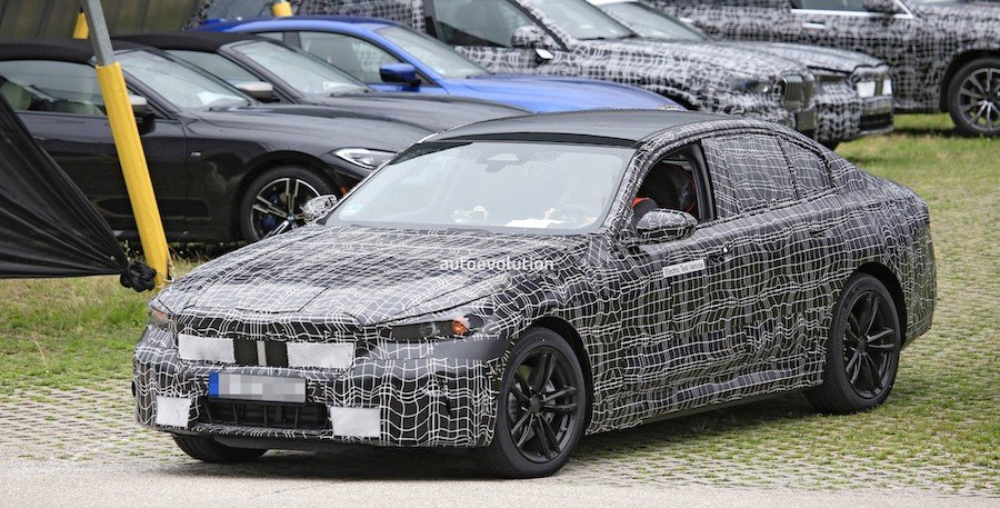 Upcoming BMW i5 Spied With Michelin Primacy Low-Resistance Tires