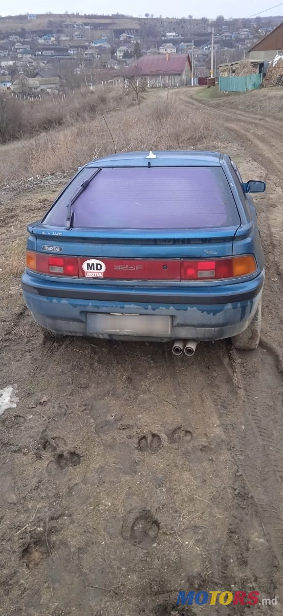 1994' Mazda 323 photo #5