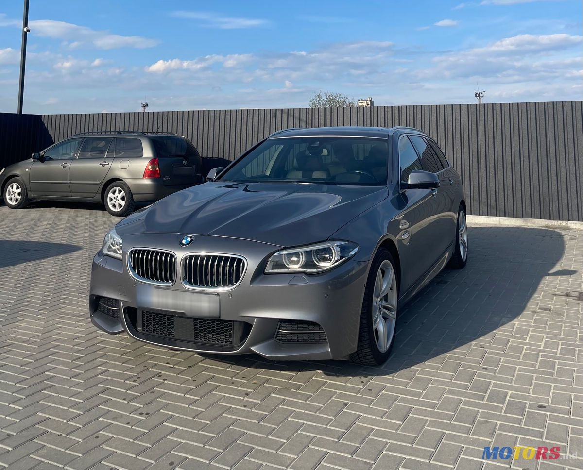 2015' BMW 5 Series Touring photo #1