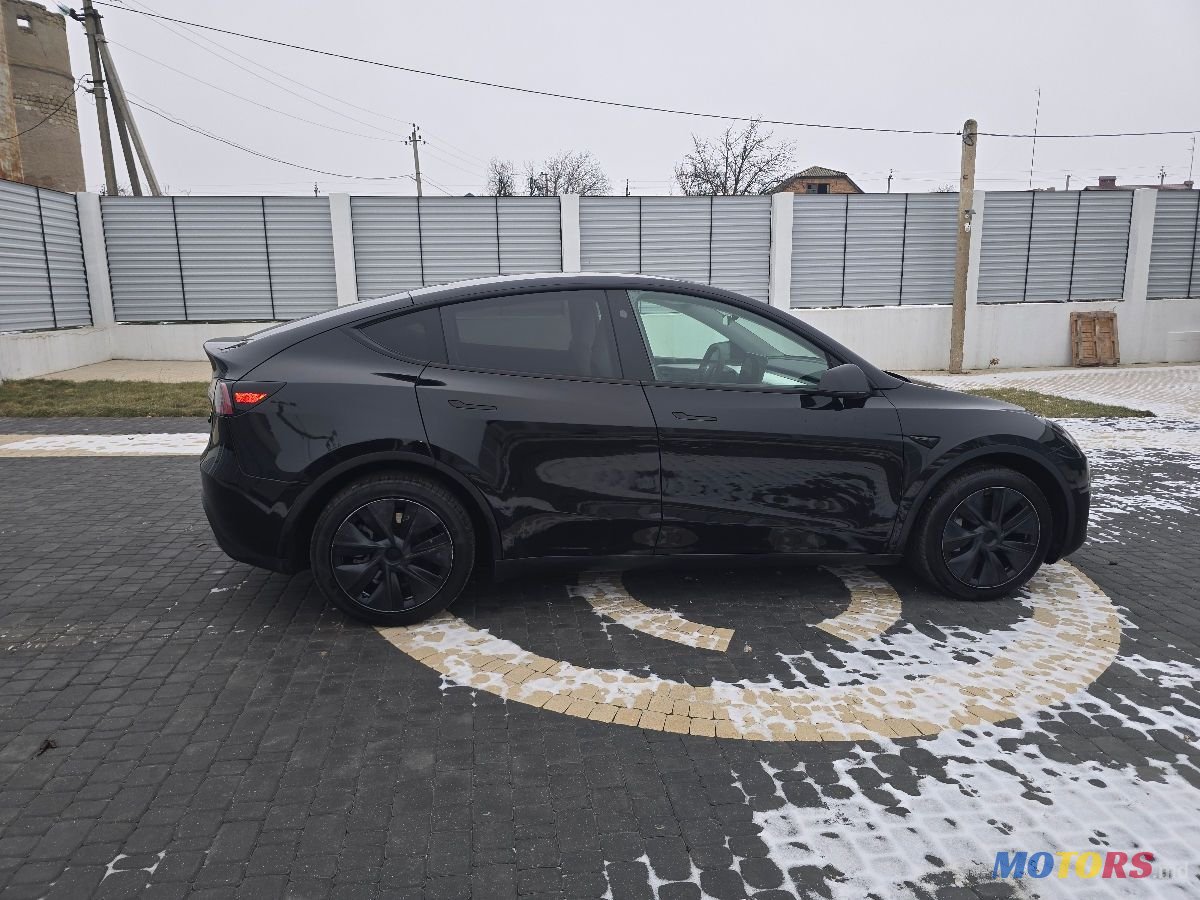 2024' Tesla Model Y photo #6