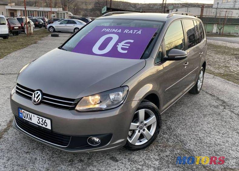 2012' Volkswagen Touran photo #1