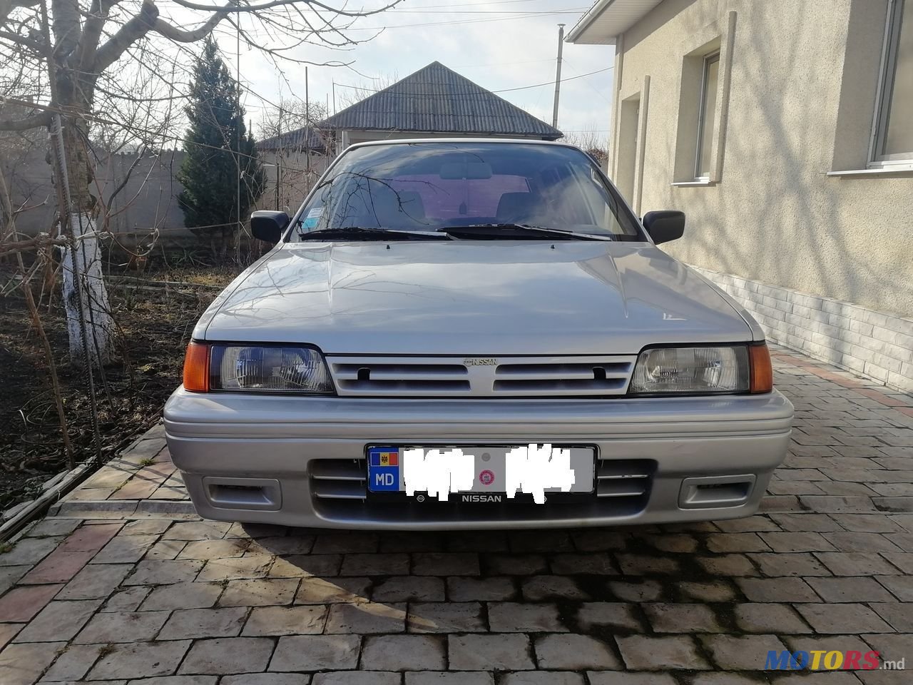 1990' Nissan Sunny photo #1