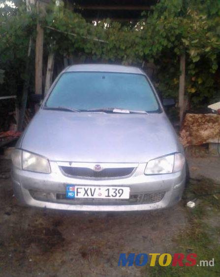 1999' Mazda 323 photo #1