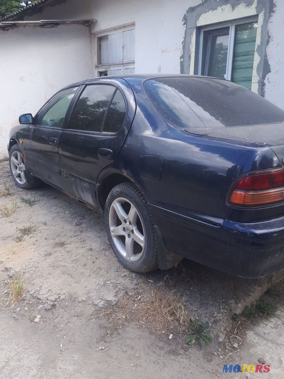 1995' Nissan Maxima photo #1