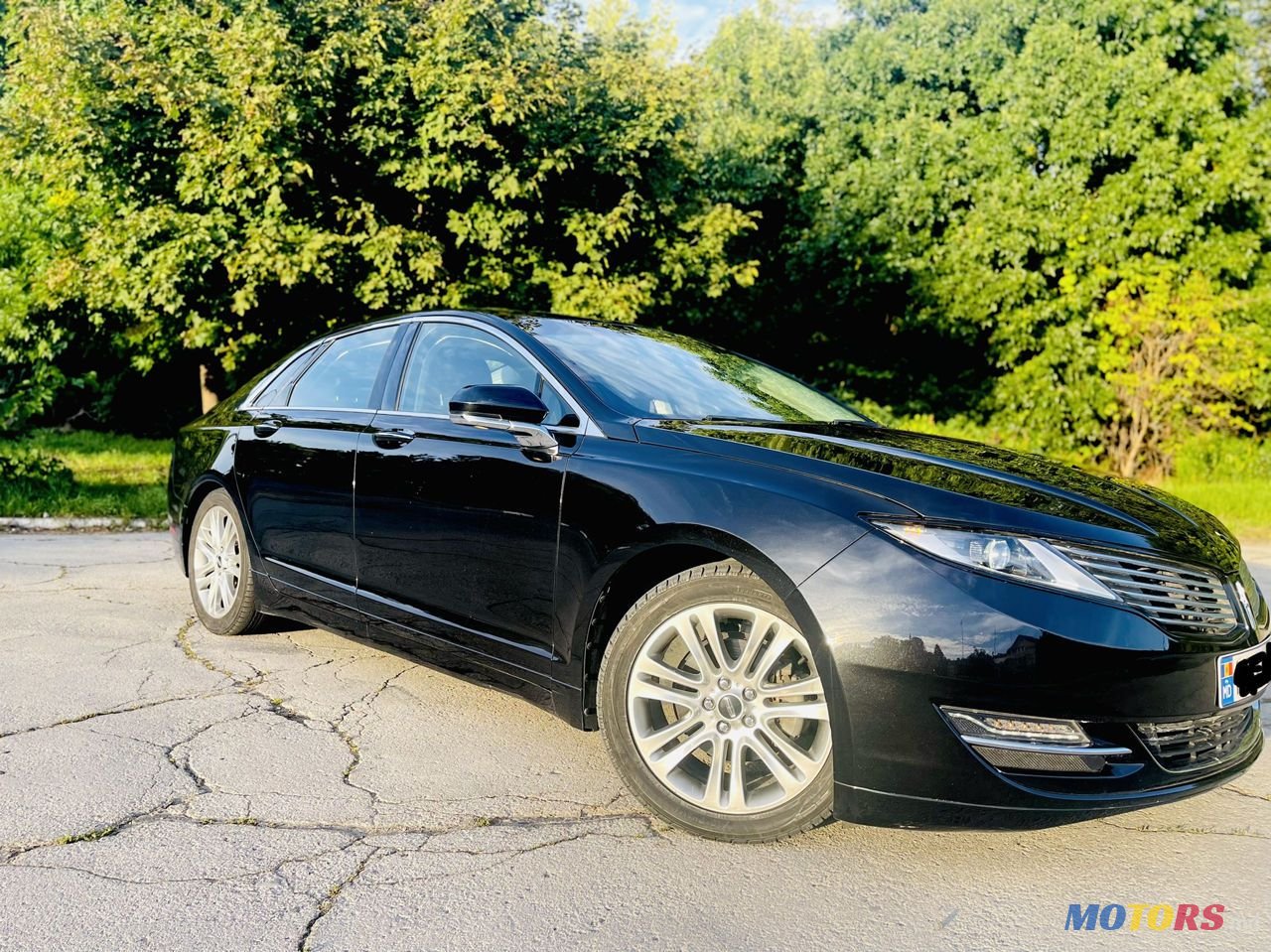 2014' Lincoln MKZ photo #5