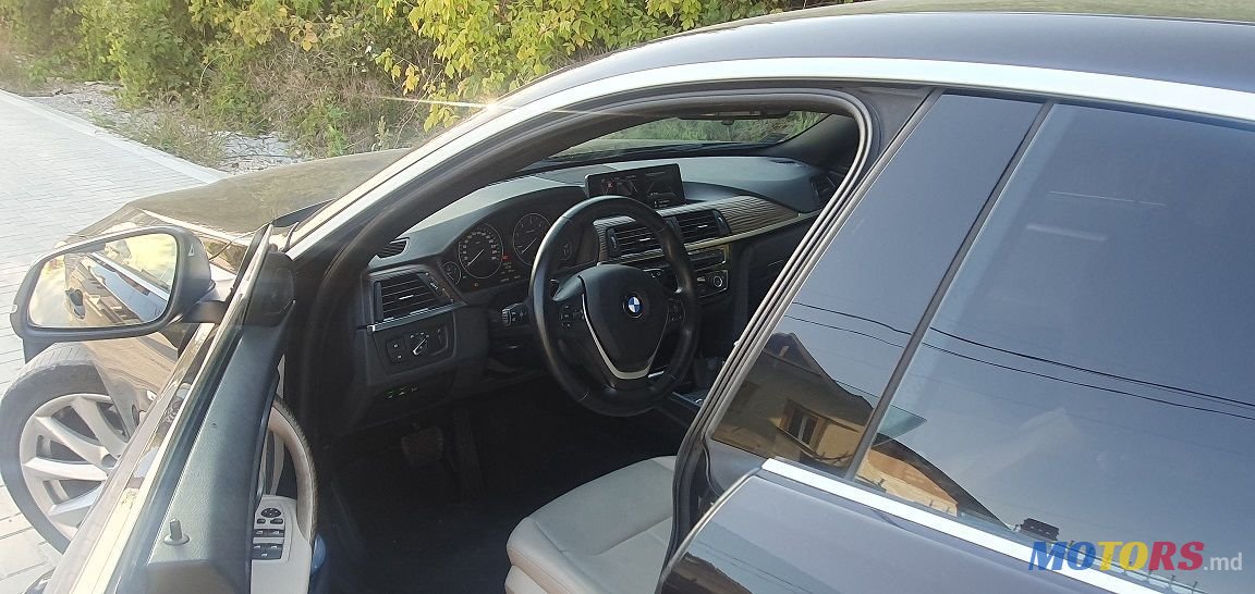 2014' BMW 5 Series photo #4
