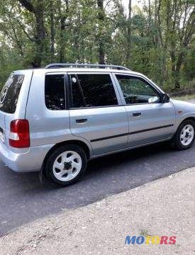 2002' Mazda Demio photo #1