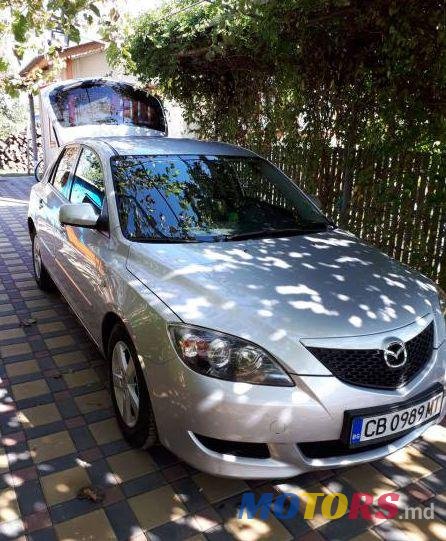 2004' Mazda 3 photo #1