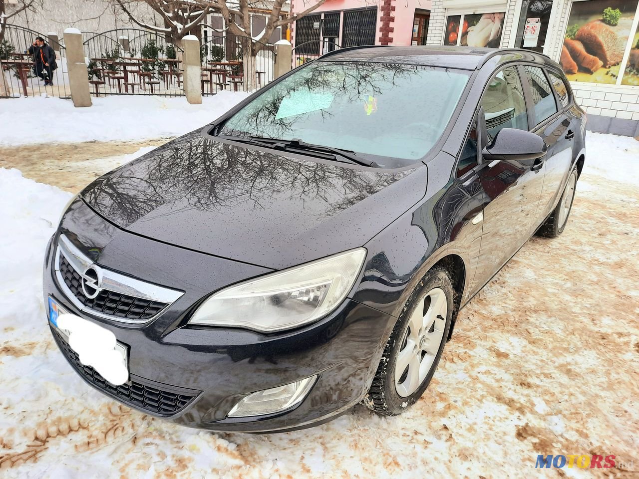 2011' Opel Astra photo #2